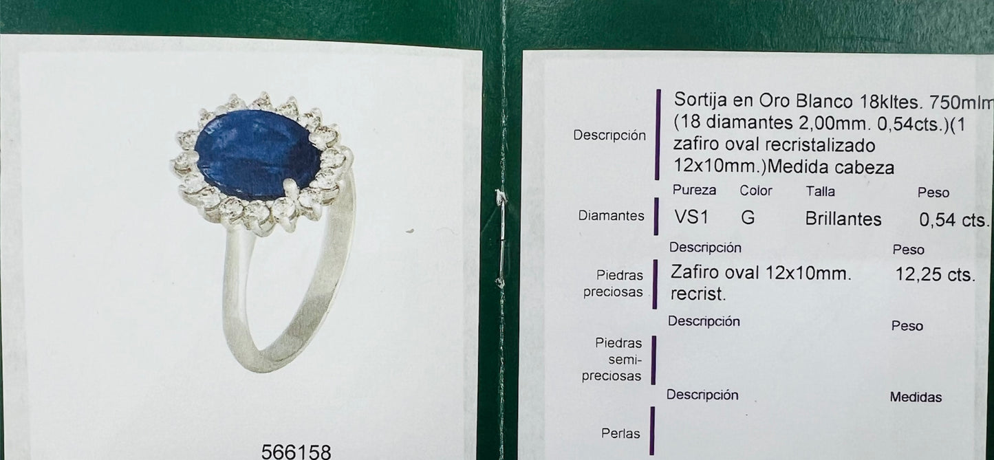 Anillo de Zafiro Oval y Brillantes en Oro Blanco de 18 kilates, 18 Brillantes y 1 Zafiro en total