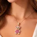 COLGANTE Oso con Circonitas y Rubíes montado en Oro Amarillo de 18 kilates