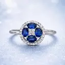 ANILLO Flor de Zafiro y BRILLANTES de Oro blanco de 18 kilates