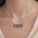 COLLAR de Oro Blanco de 18 Kilates con 5 Zafiros y 45 brillantes