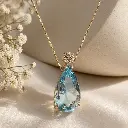 Colgante Aguamarina y Brillante en Oro Amarillo 18 kilates
